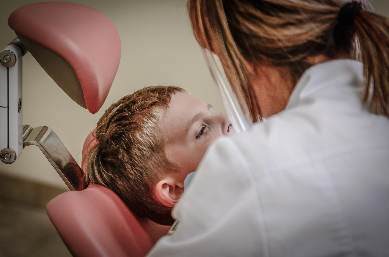 Doctor consulting with a patient in a clinic about a recent gout diagnosis